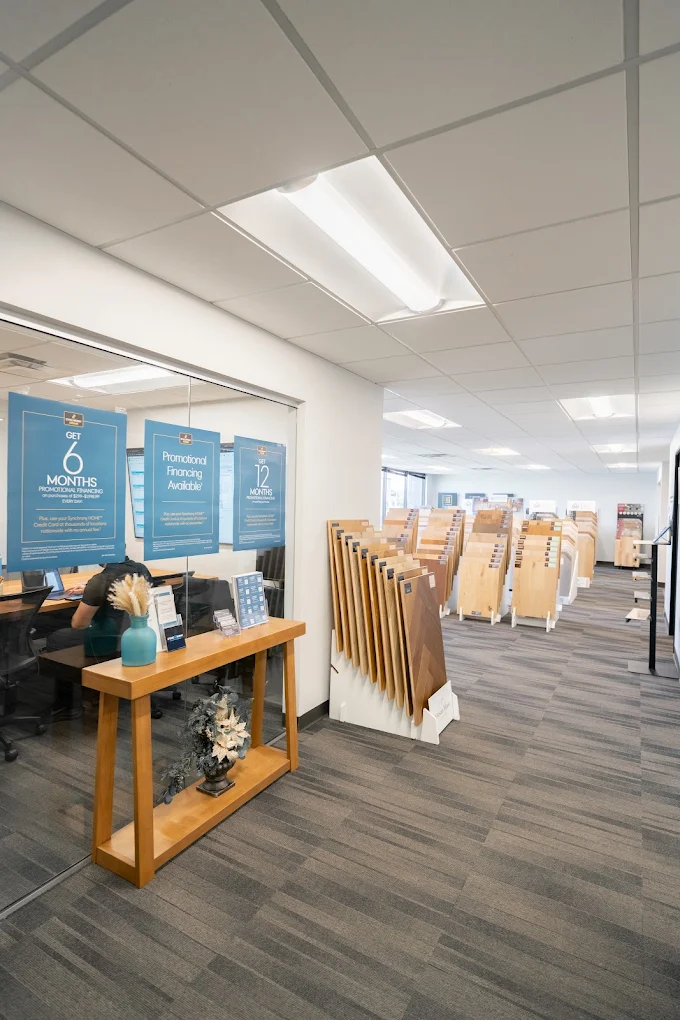 Inside the Premium Floor & Design showroom — samples and financing